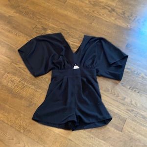 ASOS black romper with diamond cut out at tummy